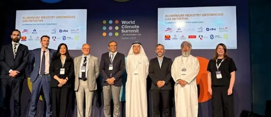 Satish Pai, Managing Director of Hindalco Industries and Chair, IAI along with dignitaries during the 'Ambition to Action' session, announcing GHG initiatives launched by IAI at COP 28